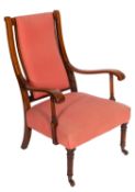 A Victorian mahogany and upholstered open armchair,