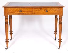 A Victorian satin maple writing table,
