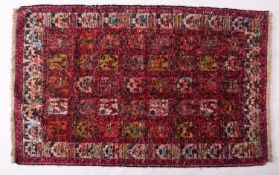 A Soumak park silk Kilim, the rose compartmented field with stylised birds and geometric designs,