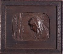 A Continental patinated bronze plaquette, circa 1900; portraying a girl,