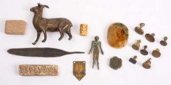 A mixed lot of small Islamic works of art including eight engraved brass seals,