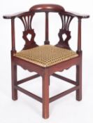 A mahogany corner elbow chair in George II style,