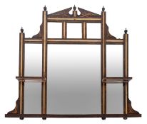 A Victorian painted and parcel silvered overmantel mirror, in Arts & Crafts taste,