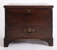 A George I oak coffer bach, circa 1720; with hinged cover and a drawer to the front,