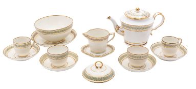 A Derby porcelain part tea and coffee service painted with bands of puce florets on a lime green