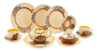 A group of Clarice Cliff Autumn Crocus pottery, comprising teapot and cover, two cups,