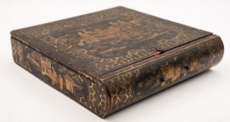 A 19th Century Chinese export lacquer 'book' travelling writing box decorated in gilt with figures