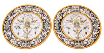 A pair of Italian majolica wall plaques, of circular form,