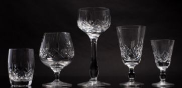 A part suite of Stuart crystal wine glasses, comprising sixteen wine glasses, twelve smaller,