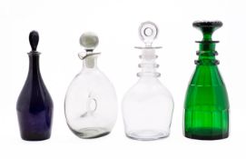 A group of four decanters and stoppers in green, blue and clear glass, 19th/20th century [4].