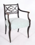 A Regency painted mahogany and upholstered open elbow chair,