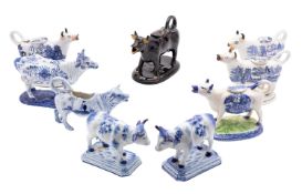 A group of nine 19th/20th century English and Continental ceramic cow creamers comprising four