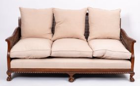 A mahogany and canework bergere suite,