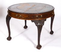 A George III and later rosewood and mahogany circular library table,