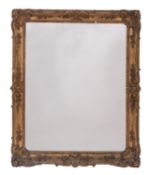 A Victorian carved giltwood and composition framed wall mirror in Rococo revival style,