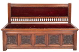 A Victorian mahogany and upholstered settle, in late 17th century taste,