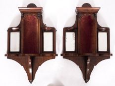 A pair of Edwardian rosewood, line inlaid and mirrored glass wall display brackets,