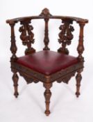 An Italian carved walnut tub elbow chair in 17th century style,
