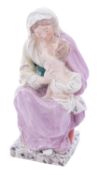 A large Staffordshire pearlware group of The Madonna and Child,