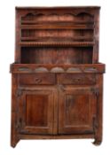 A Continental provincial walnut dresser,