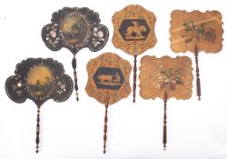 A pair of Victorian painted and mother-of-pearl inset papier mache face screens,