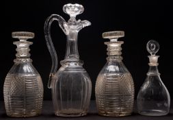 A pair of heavy cut glass decanters and stoppers,