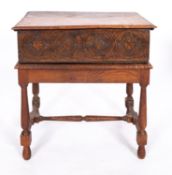 A 17th century oak Bible box and later stand,