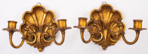 A pair of giltwood and composition twin light wall appliques, in Rococo style,