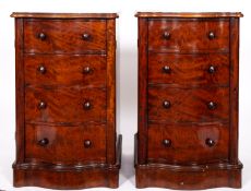 A pair of fine Victorian mahogany serpentine front Wellington chests,
