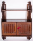 A Victorian walnut hanging cabinet in Aesthetic Movement style,