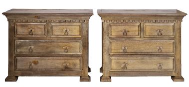 A pair of French limed oak and softwood chests of drawers, in antique style,
