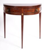 A Regency style mahogany and brass strung demi-lune folding card table,