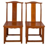 A pair of Chinese stained hardwood chairs,