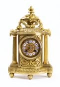 A French mantel clock the eight-day duration movement striking the hours and half-hours on a bell