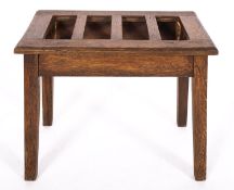 An Edwardian oak luggage stand,