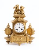 A French mantel clock the eight-day duration movement striking the hours and half-hours on a bell,