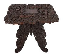 An Anglo-Indian carved and stained hardwood occasional table, probably Burmese,