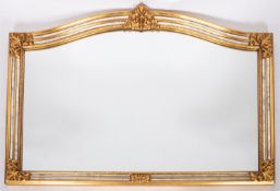 A Continental gilt composition framed marginal wall mirror,