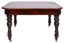 A Victorian mahogany extending dining table,