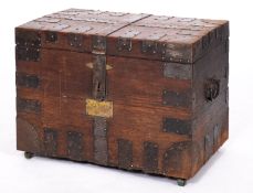 A Victorian oak and iron banded silver chest,