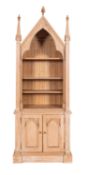 A pine cabinet bookcase in 'Gothic' taste,