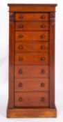 A Victorian mahogany Wellington chest, late 19th century; the top with moulded edges,