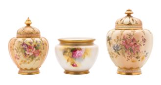 Two Royal Worcester blush ivory pot-pourri jars and pierced covers and a similar small jardiniere