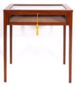 An Edwardian mahogany and line inlaid bijouterie table,