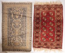 A Turkoman rug, the rose field with two rows of quartered medallion,