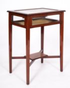 An Edwardian mahogany and line inlaid bijouterie table,