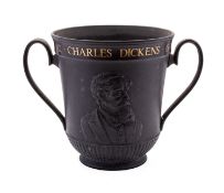 A Wedgwood black basalt commemorative loving cup, for the centenary of Charles Dickens death,