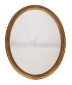 A Victorian gilt composition framed oval wall mirror,