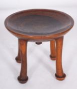 An African hardwood low table, possibly Senufo, West Africa,