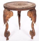 A South East Asian, probably Burmese carved hardwood and ivory mounted circular occasional table,